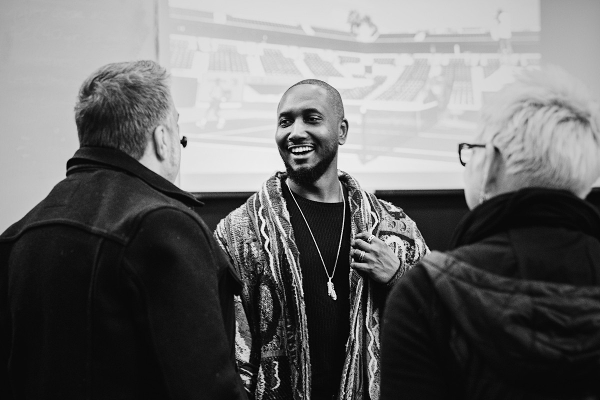 Marcus Smith talking with friends